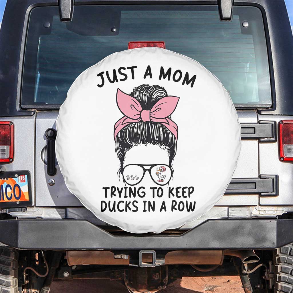 Just A Mom Trying To Keep Her Ducks In A Row Spare Tire Cover Funny Duck Mom Messy Hair Bun Moms Life TS14 No hole White Print Your Wear