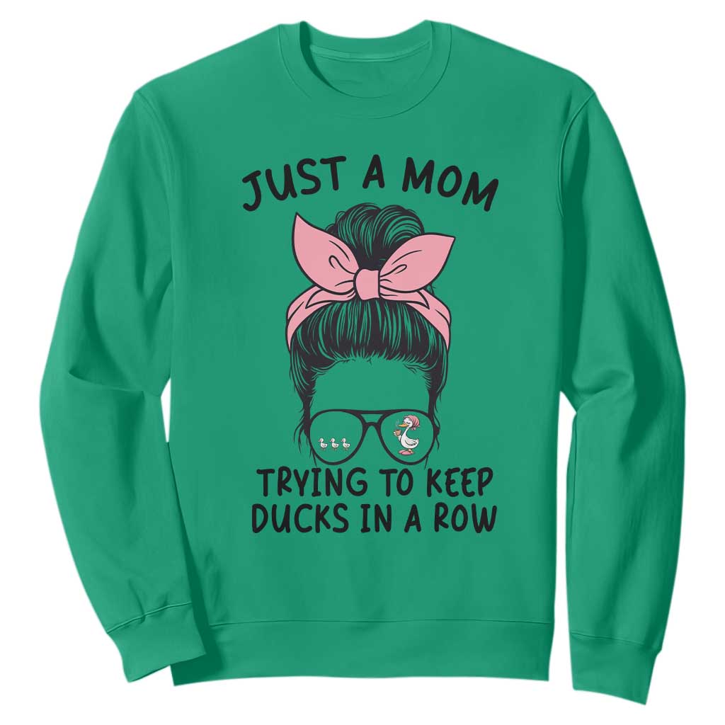 Just A Mom Trying To Keep Her Ducks In A Row Sweatshirt Funny Duck Mom Messy Hair Bun Moms Life TS14 Irish Green Print Your Wear