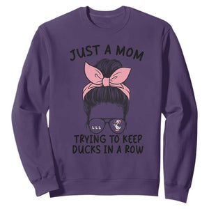 Just A Mom Trying To Keep Her Ducks In A Row Sweatshirt Funny Duck Mom Messy Hair Bun Moms Life TS14 Purple Print Your Wear