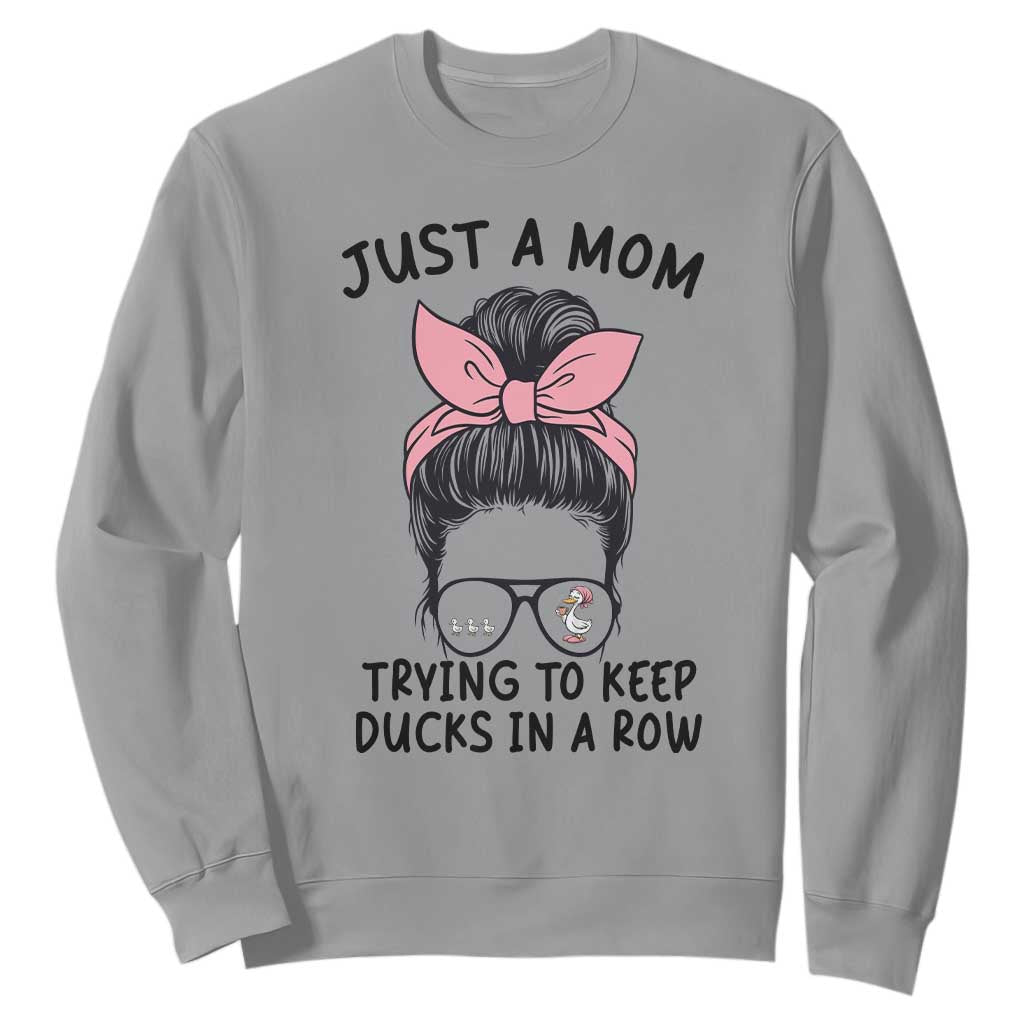 Just A Mom Trying To Keep Her Ducks In A Row Sweatshirt Funny Duck Mom Messy Hair Bun Moms Life TS14 Sport Gray Print Your Wear
