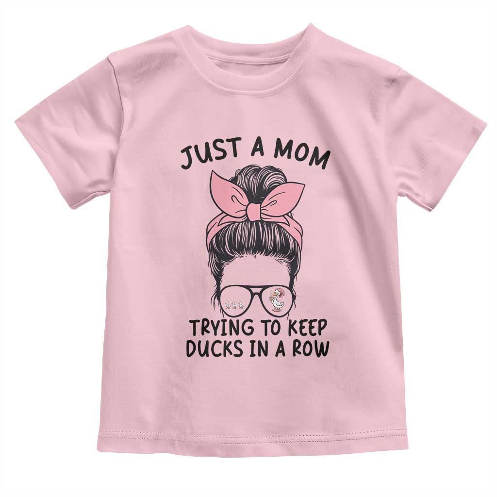 Just A Mom Trying To Keep Her Ducks In A Row Toddler T Shirt Funny Duck Mom Messy Hair Bun Moms Life TS14 Light Pink Print Your Wear