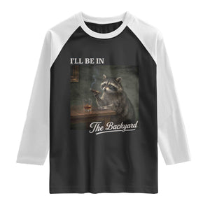 I'll Be in the Backyard Raglan Shirt Funny Whiskey Cigar Raccoon Dad Meme