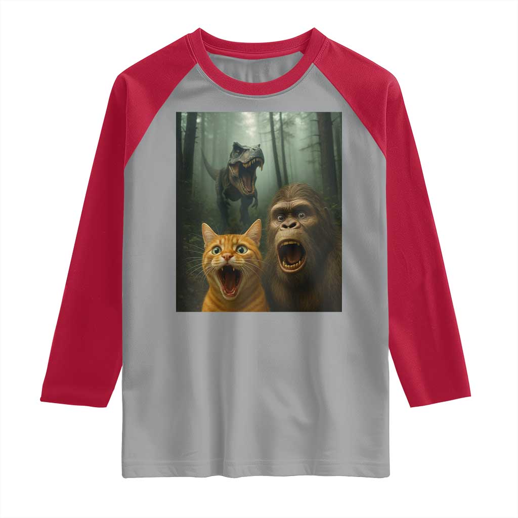 Cat Bigfoot Selfie With Dinosaur Raglan Shirt Funny Surprised Scared Sasquatch Cat TS14 Sport Gray Red Print Your Wear