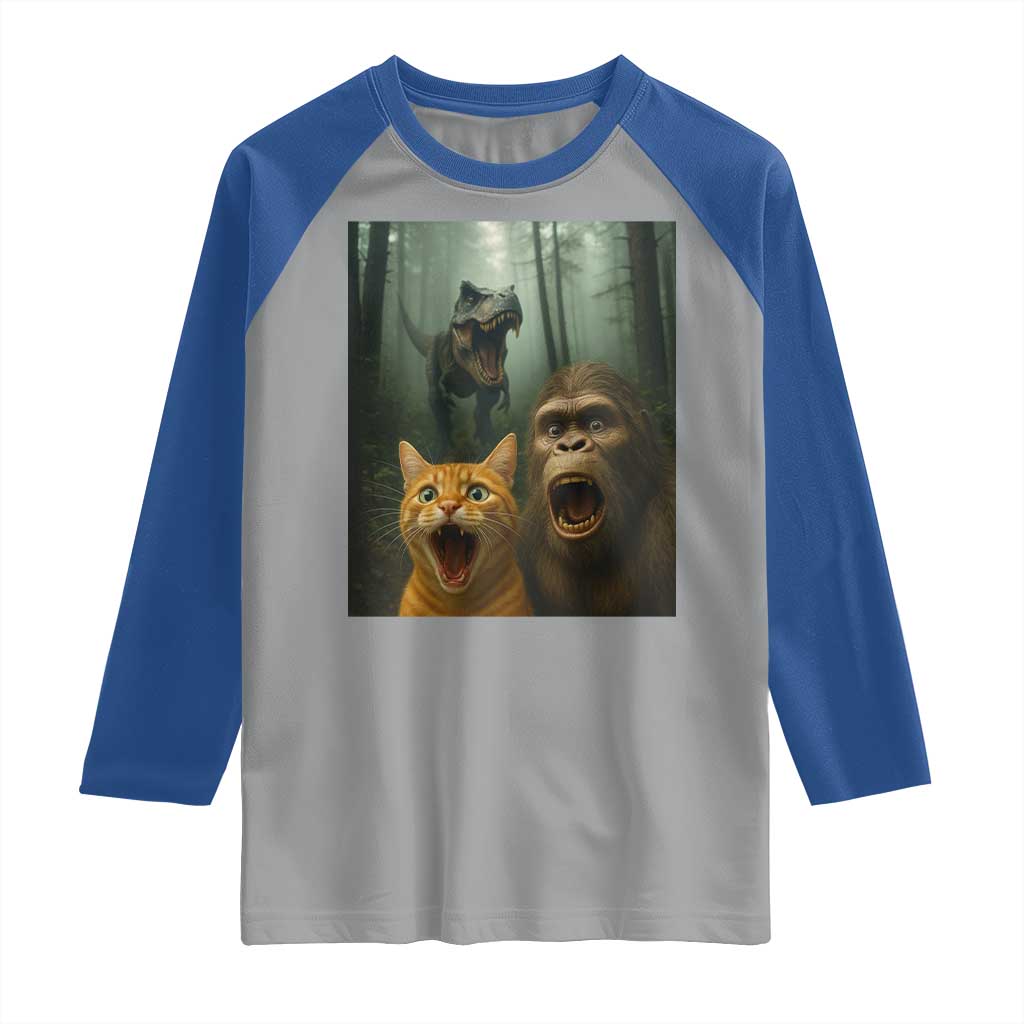 Cat Bigfoot Selfie With Dinosaur Raglan Shirt Funny Surprised Scared Sasquatch Cat TS14 Sport Gray Royal Print Your Wear