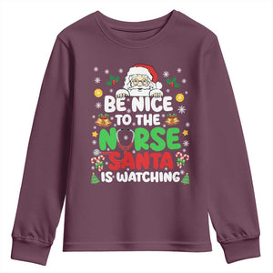 Christmas Nurse Youth Sweatshirt Be Nice To The Nurse Santa Is Watching TS14 Maroon Print Your Wear