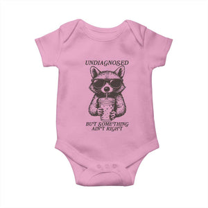 Undiagnosed But Something Aint Right Baby Onesie Funny Racoon Saying TS14 Light Pink Print Your Wear