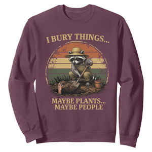 I Bury Things Maybe Plants Maybe People Sweatshirt Funny Gardening Raccoon Meme TS14 Maroon Print Your Wear