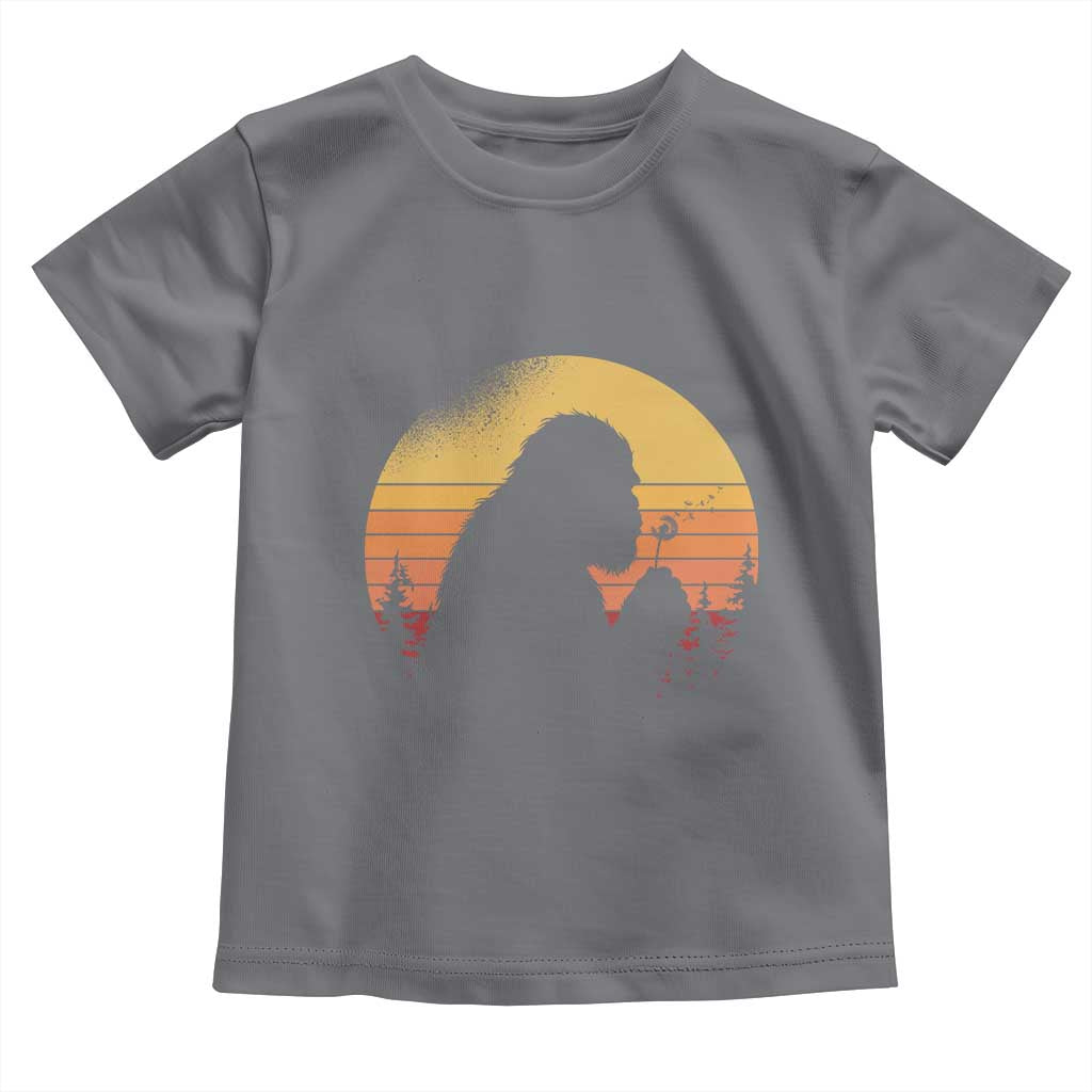Bigfoot Blowing Dandelion Toddler T Shirt Retro Sunset Forest TS14 Charcoal Print Your Wear