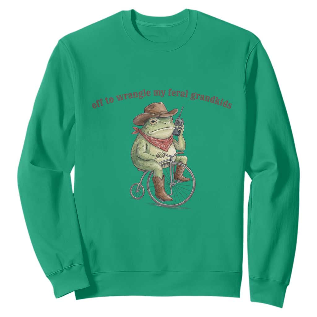 Off to Wrangle My Feral Grandkids Sweatshirt Funny Cowboy Frog Grandpa Western Meme TS14 Irish Green Print Your Wear