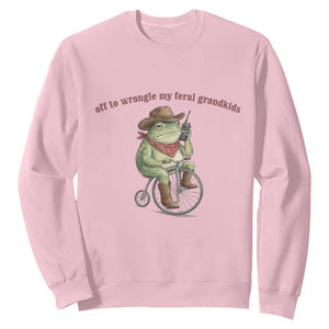 Off to Wrangle My Feral Grandkids Sweatshirt Funny Cowboy Frog Grandpa Western Meme TS14 Light Pink Print Your Wear