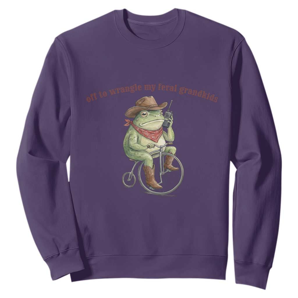 Off to Wrangle My Feral Grandkids Sweatshirt Funny Cowboy Frog Grandpa Western Meme TS14 Purple Print Your Wear