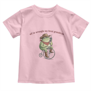 Off to Wrangle My Feral Grandkids Toddler T Shirt Funny Cowboy Frog Grandpa Western Meme TS14 Light Pink Print Your Wear