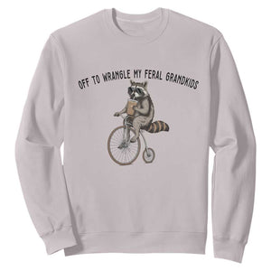 Off To Wranglin My Feral Grandkids Sweatshirt Funny Raccoon Grandpa Father's Day Gift TS14 Ice Gray Print Your Wear