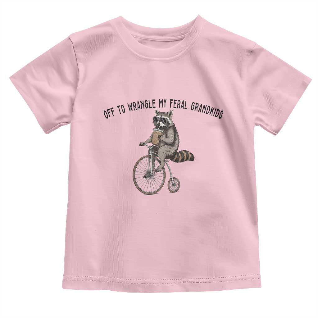 Off To Wranglin My Feral Grandkids Toddler T Shirt Funny Raccoon Grandpa Father's Day Gift TS14 Light Pink Print Your Wear