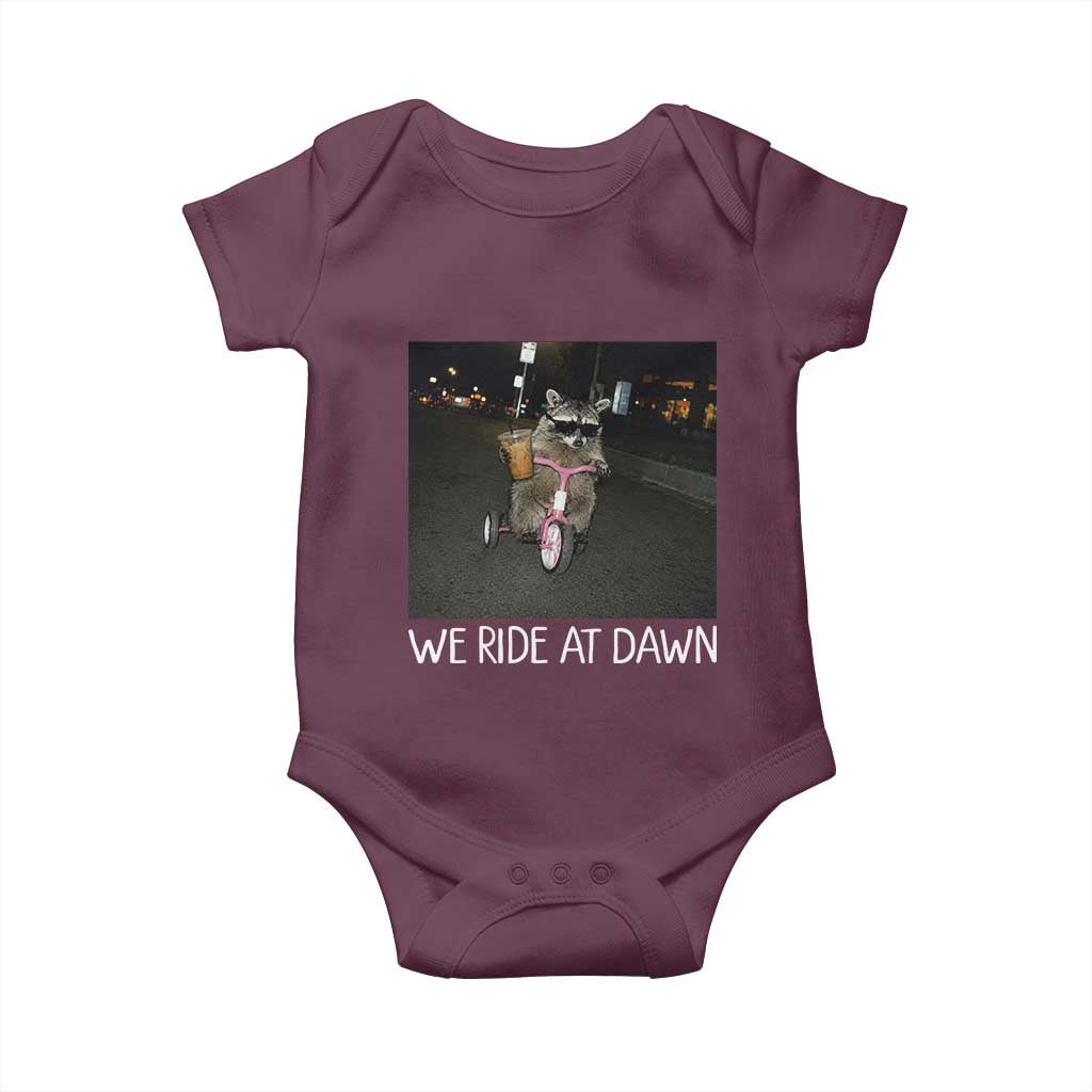 We Ride at Dawn Baby Onesie Funny Racoon Riding Tricycle Chaotic Meme
