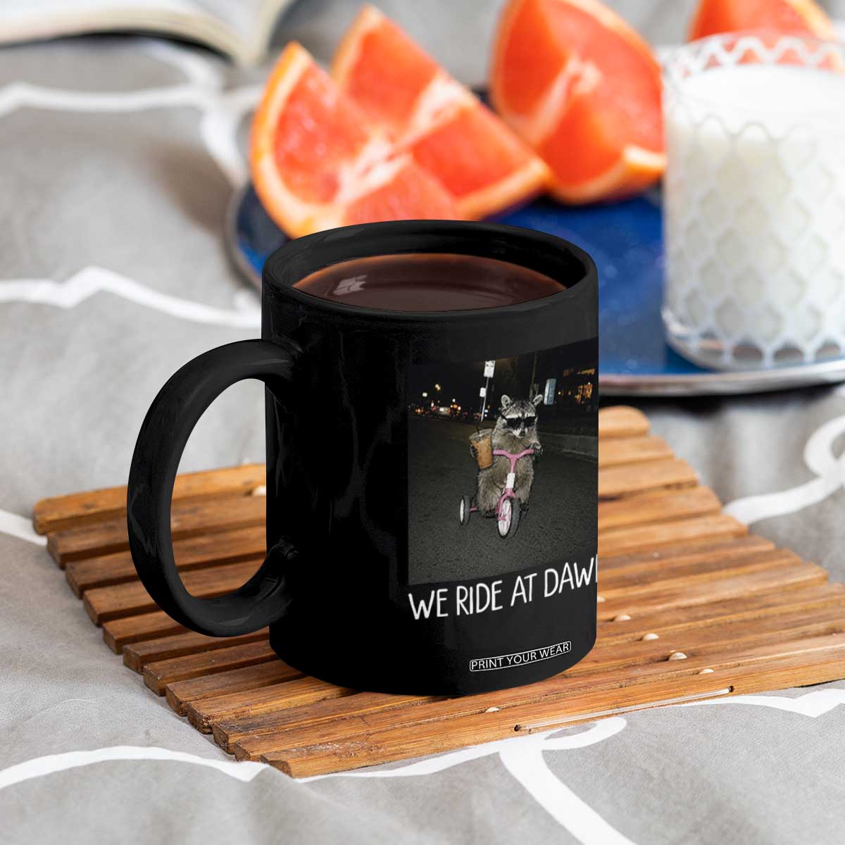 We Ride at Dawn Coffee Mug Funny Racoon Riding Tricycle Chaotic Meme