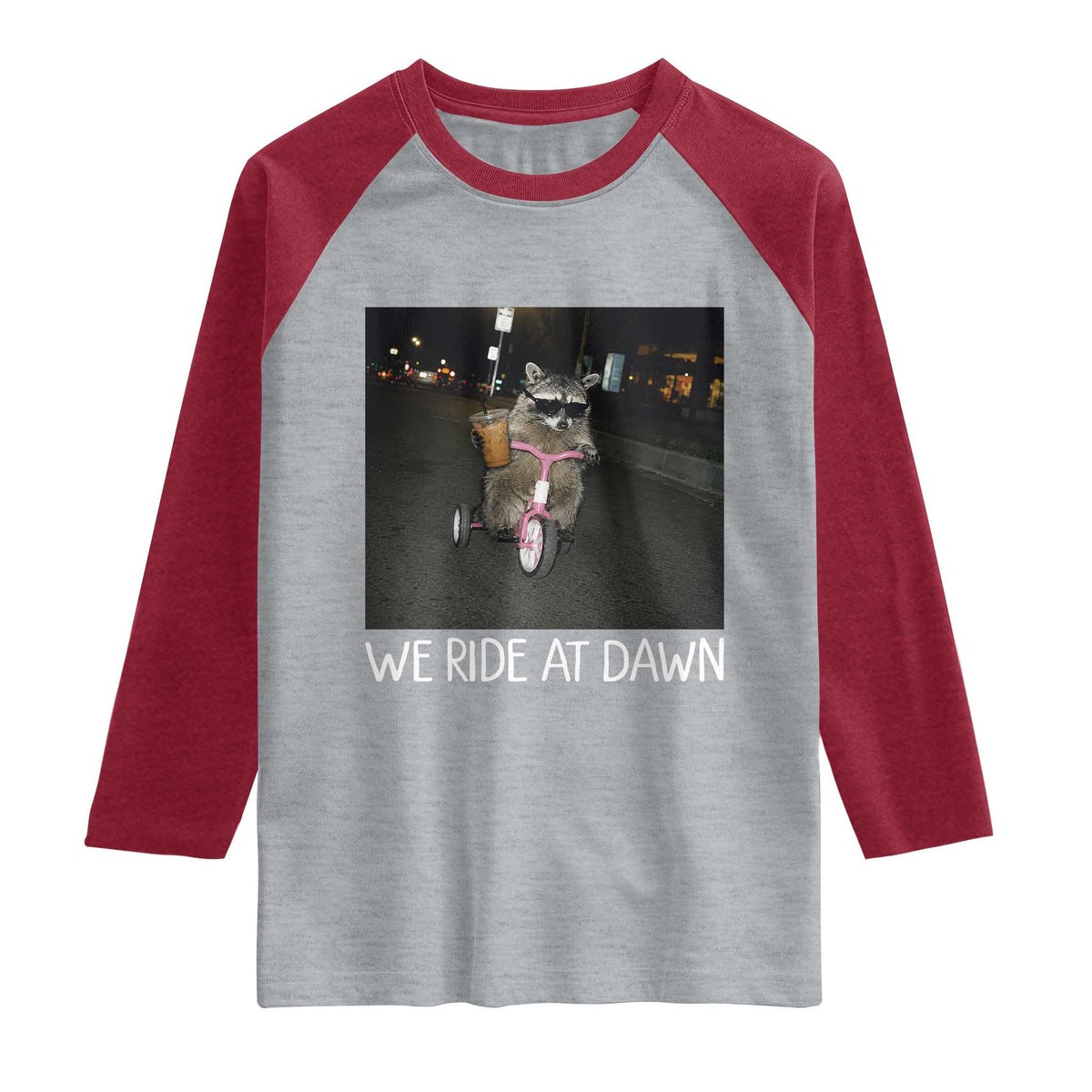 We Ride at Dawn Raglan Shirt Funny Racoon Riding Tricycle Chaotic Meme