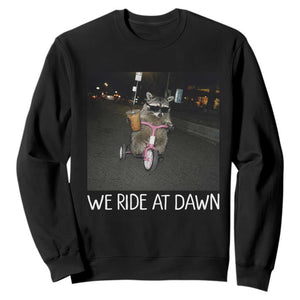 We Ride at Dawn Sweatshirt Funny Racoon Riding Tricycle Chaotic Meme