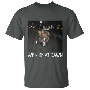 We Ride at Dawn T Shirt Funny Racoon Riding Tricycle Chaotic Meme