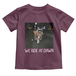 We Ride at Dawn Toddler T Shirt Funny Racoon Riding Tricycle Chaotic Meme