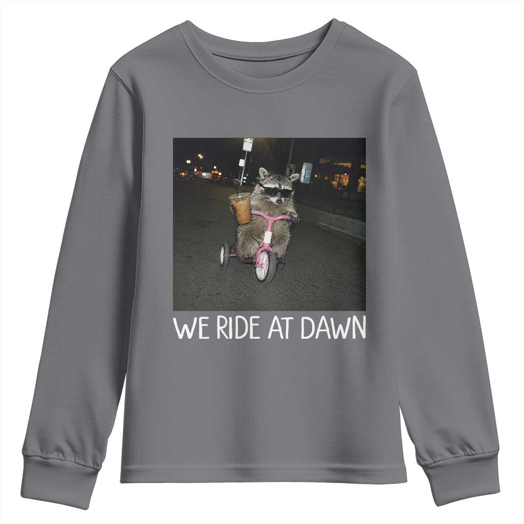 We Ride at Dawn Youth Sweatshirt Funny Racoon Riding Tricycle Chaotic Meme