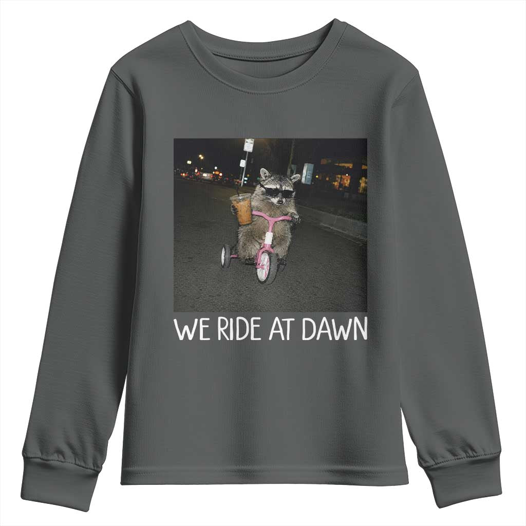 We Ride at Dawn Youth Sweatshirt Funny Racoon Riding Tricycle Chaotic Meme