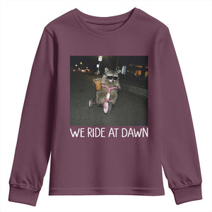 We Ride at Dawn Youth Sweatshirt Funny Racoon Riding Tricycle Chaotic Meme