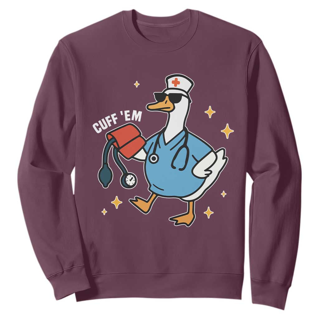 Cuff 'Em ER Nurse Sweatshirt Funny Silly Goose Meme TS14 Maroon Print Your Wear