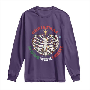 Funny Skeleton Christian Long Sleeve Shirt Christmas Begins With Christ TS14 Purple Print Your Wear