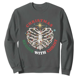 Funny Skeleton Christian Sweatshirt Christmas Begins With Christ TS14 Dark Heather Print Your Wear