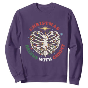 Funny Skeleton Christian Sweatshirt Christmas Begins With Christ TS14 Purple Print Your Wear