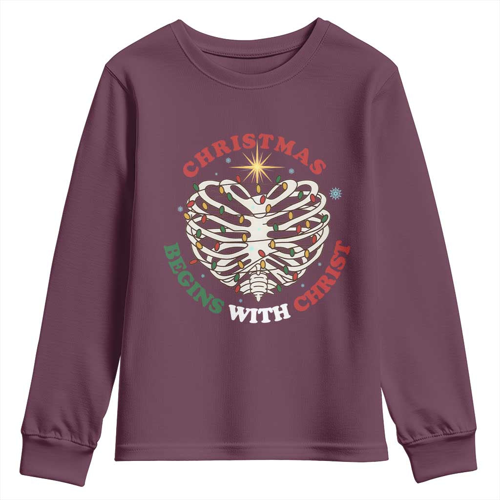 Funny Skeleton Christian Youth Sweatshirt Christmas Begins With Christ TS14 Maroon Print Your Wear